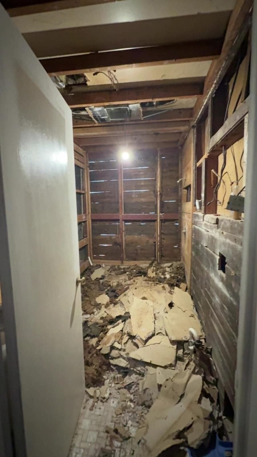 Interior demolition before drywall repair