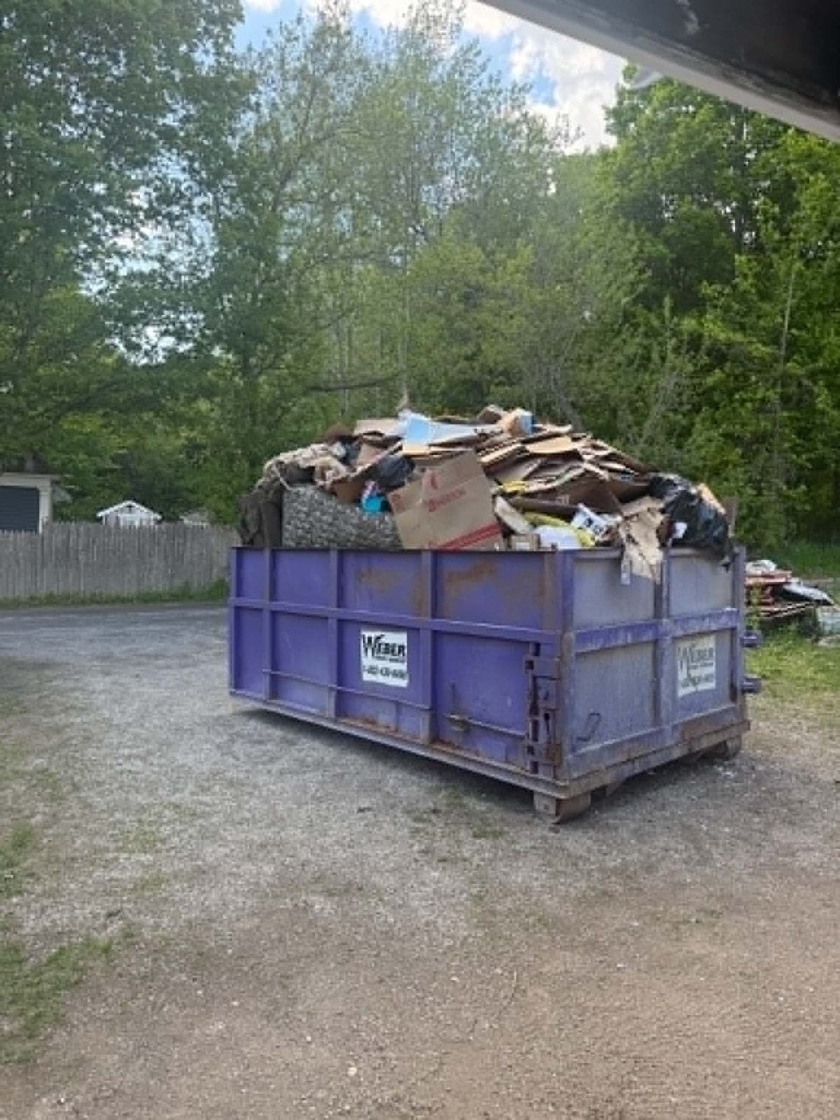 Full dumpster of construction debris