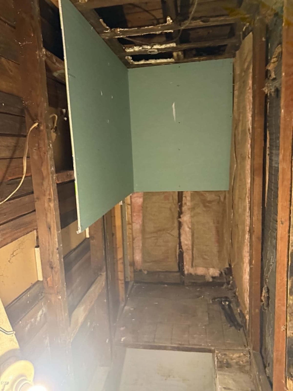 Wall torn out to the studs before Poppa Mark repair