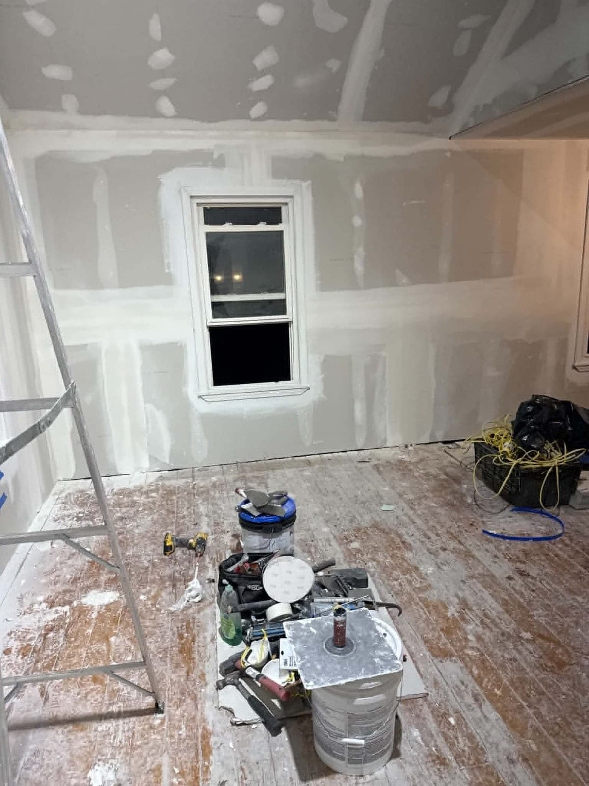Drywall taped, mudded, and sanded paint-ready